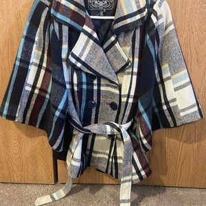 Woman’s plaid coat